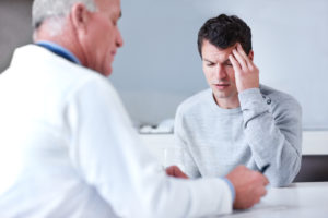 doctor prescribes medicine for migraine treatment