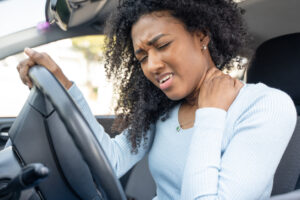 A young lady suffered with car accident pain